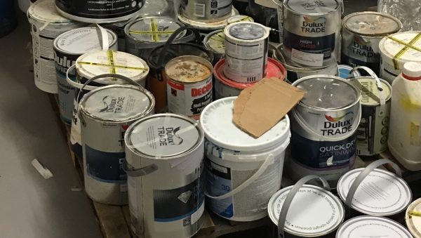 Waste paint tins for recycling